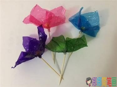 儿童手工七彩糖果纸花朵制作